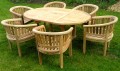 Round Teak Extending Leaf Table Set with Banana Arm Chairs
